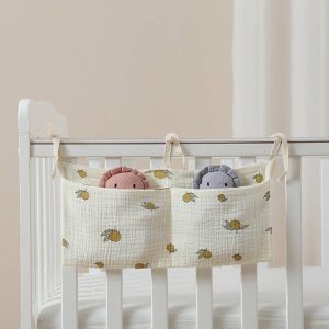 Organisateur de lit bébé – Rangement pratique pour couches et accessoires bébé
